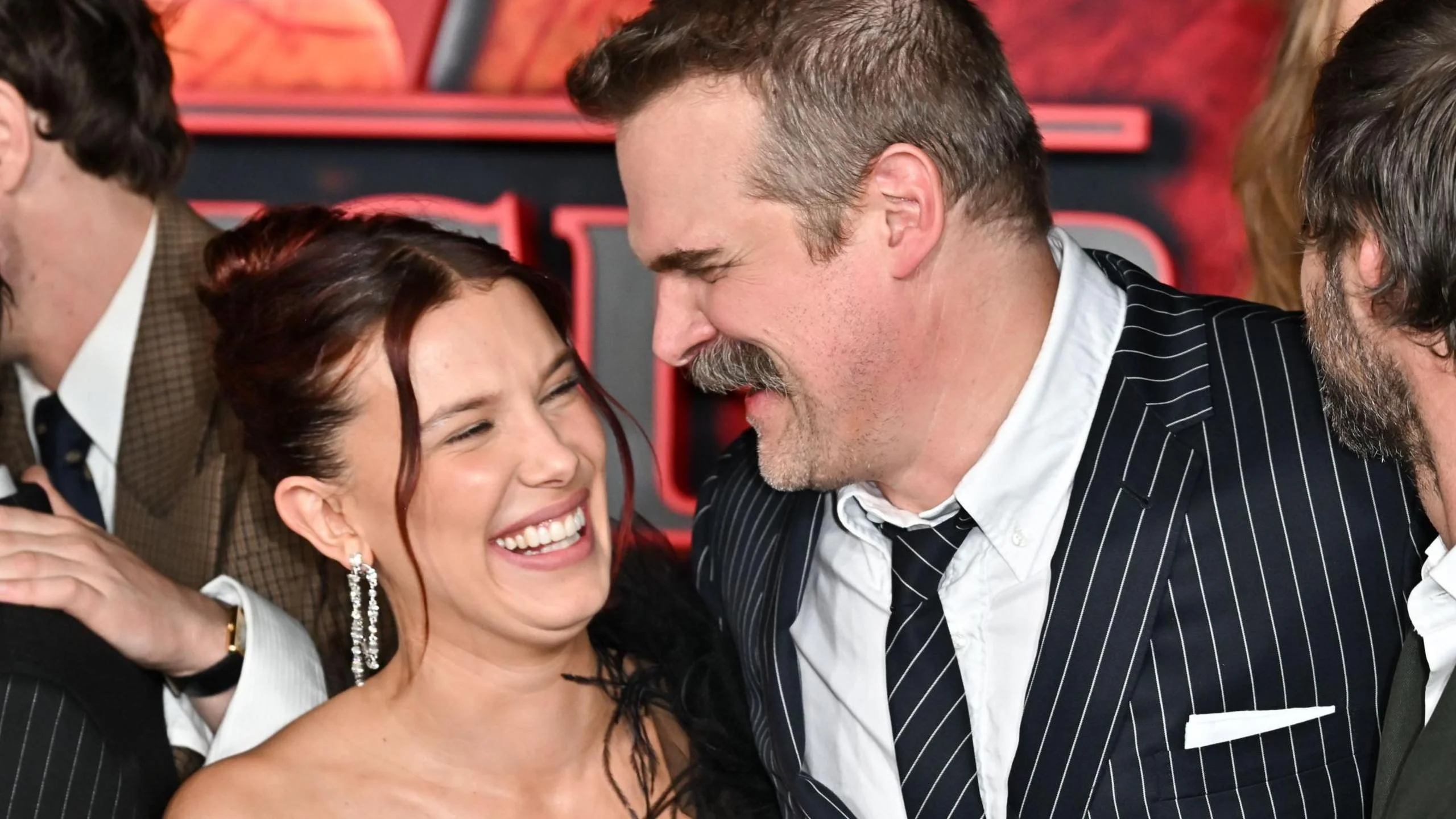 Millie Bobby Brown and David Harbour embrace at Stranger Things premiere - BBC News