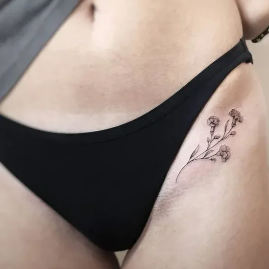 Hình xăm hoa mini vùng bikini (3)