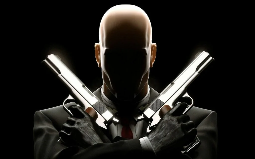 Hình nền Hitman cầm hai khẩu súng, tạo dáng lạnh lùng.